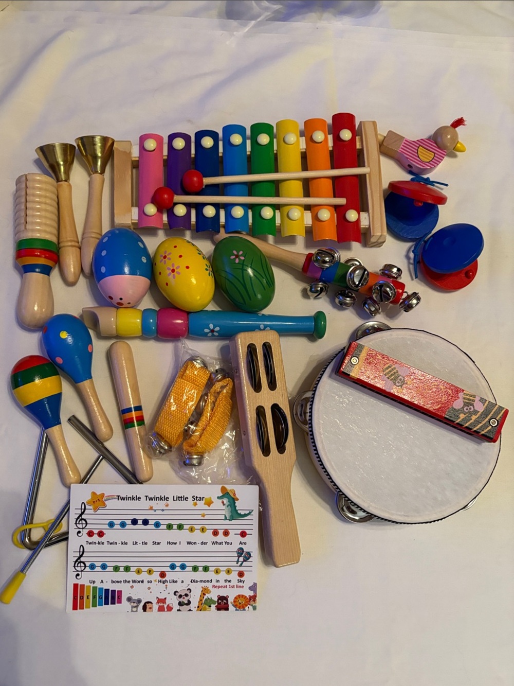 Multicolor Kids Wooden Musical Instrument Set with backpack.